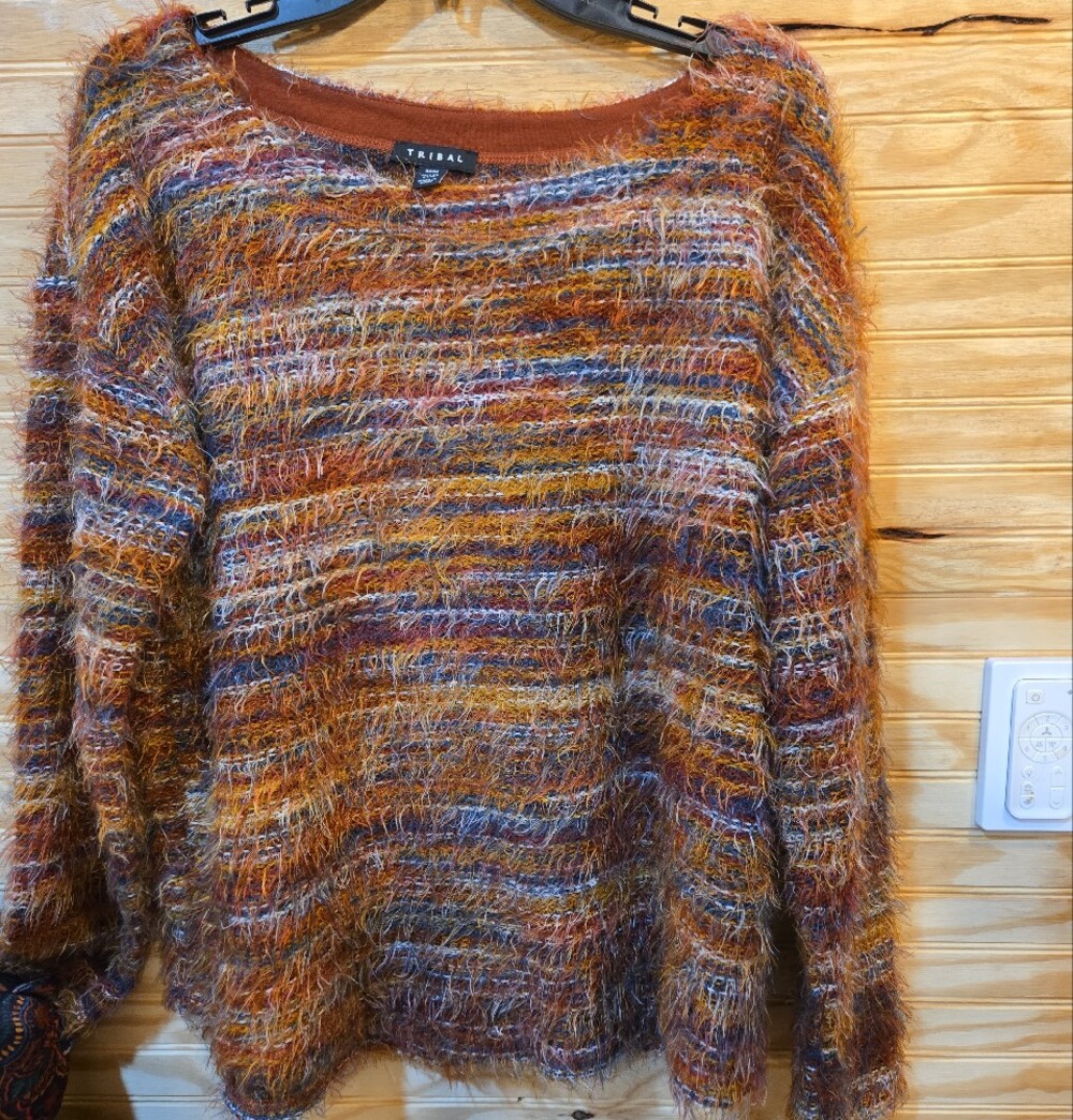 TRIBAL - Picture 3 of 4